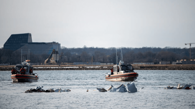 Crash site with Coast Guard response boats