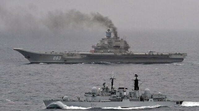 Aging Soviet-era vessels like the Admiral Kuznetsov (above) have shaped public perceptions of the Russian Navy, but the service is modernizing with investments in frigates, subs and guided weapons (Royal Navy file image)
