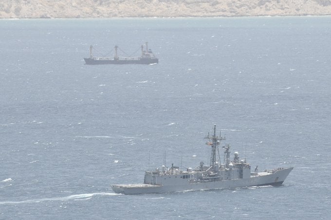 warship monitoring hijacked vessel
