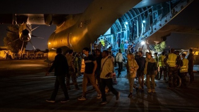 Foreign nationals disembark a French transport plane after evacuation from Khartoum (French Embassy in Khartoum)