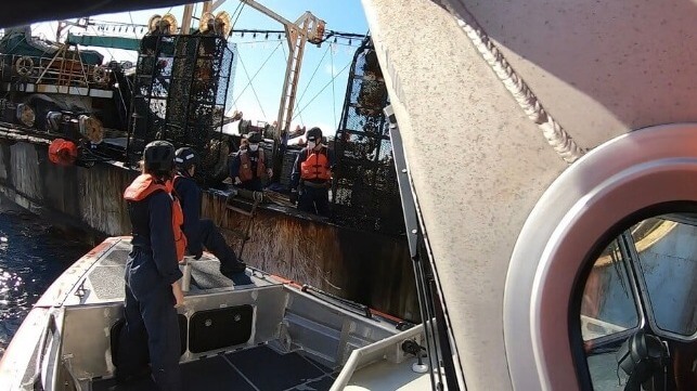 A U.S. Coast Guard boarding of a squid jigger off the Galapagos Islands