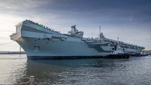 HMS Prince of Wales berthing with tug assistance