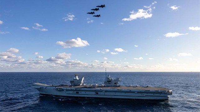 Royal Navy aircraft carrier and fighter jets
