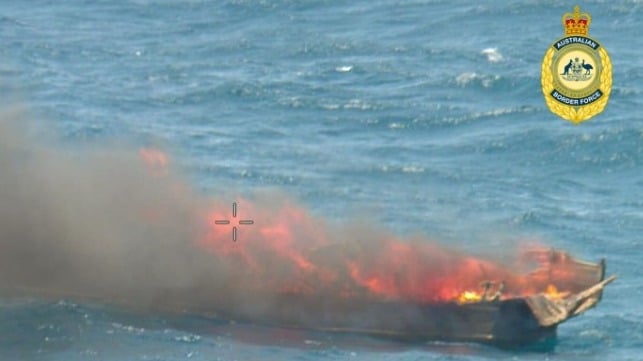 Indonesian fishing boat burned at sea after confiscation of an illegal catch, Dec. 18 (ABF)