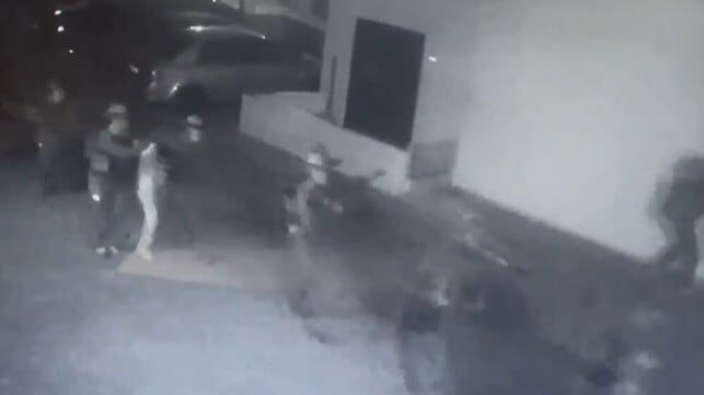 Low-resolution security camera footage recorded the raid (Lebanese social media)