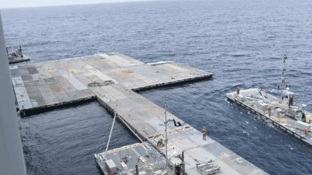 Construction of the floating causeway under way off Gaza (USN file image)