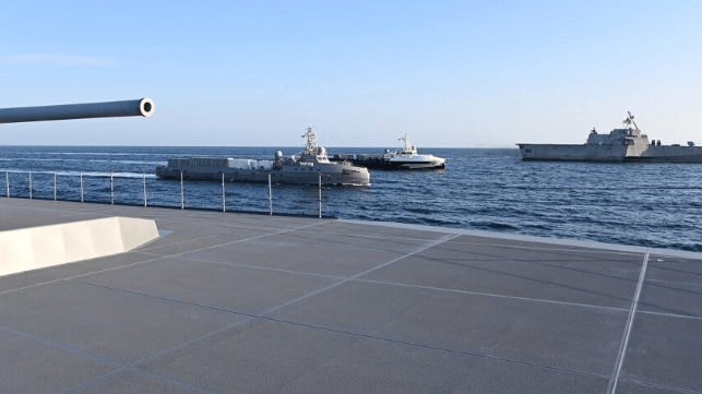 The USVs Mariner and Ranger, center, as seen from the deck of JS Kumano (JMSDF)