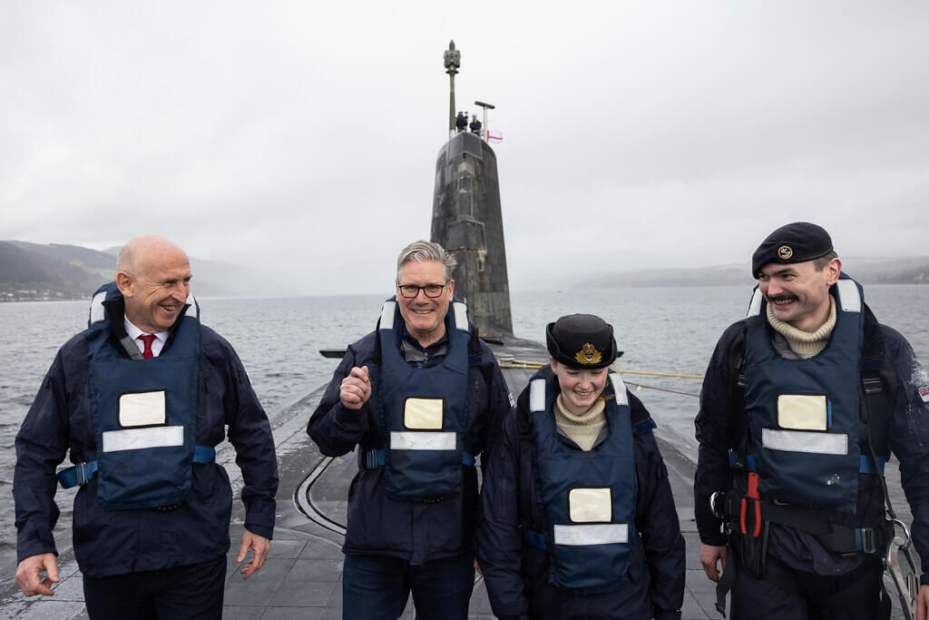 Then-Defence Minister John Healey welcomes home a Vanguard ballistic missile submarine after a 203-day patrol (UK MoD)