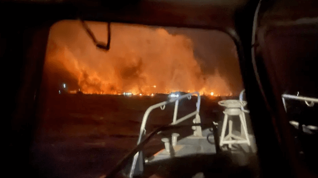 The fire at Lahaina, as seen from a Coast Guard response boat on August 8 (USCG)