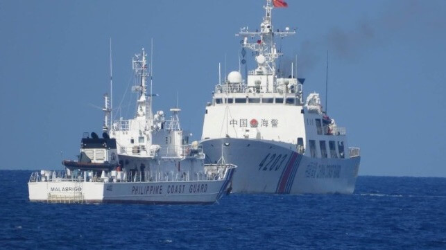 A China Coast Guard vessel cuts across the bow of a Philippine Coast Guard cutter near Second Thomas Shoal (PCG)
