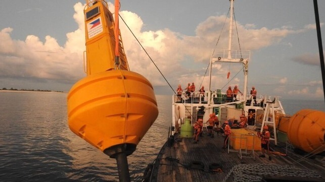 https://maritime-executive.com/media/images/article/Photos/Navy_Govt_CoastGuard/PCG-installs-buoys-spratly-islands.56ae0d.jpg