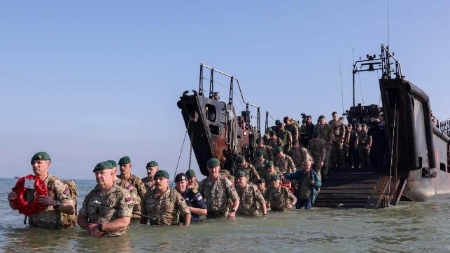 Royal Marines of 47 Commando re-enact their forebearers' historic landing on Gold Beach, 80 years ago Thursday (Royal Marines)