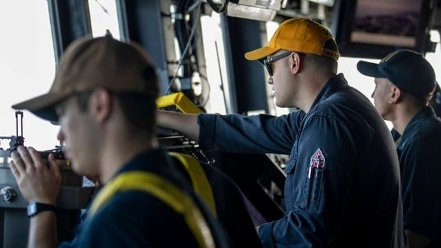 Crewmembers stand watch on USS Ralph Johnson's bridge, August 21 (USN)