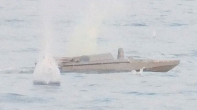 A Ukrainian drone boat under fire (file image courtesy Russian MOD)