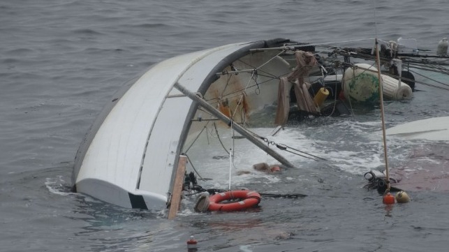 capsized sailboat
