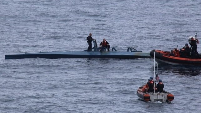U.S. Coast Guard boarding team inspects a semi-sub smuggling craft (USCG)