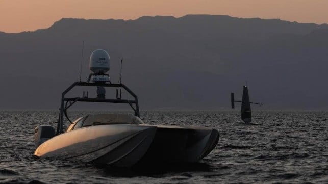 A T-38 Devil Ray (left) and a Saildrone (right) in the U.S. 5th Fleet area of responsibility (Task Force 59)