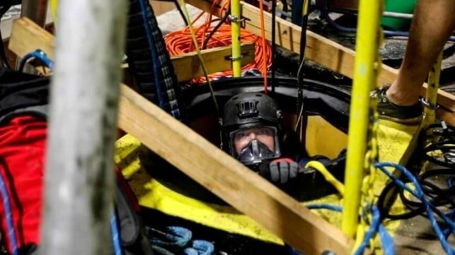 A Navy diver inspects the contaminated well at the Red Hill Bulk Fuel Storage Facility near Pearl Harbor, 2021 (USN)