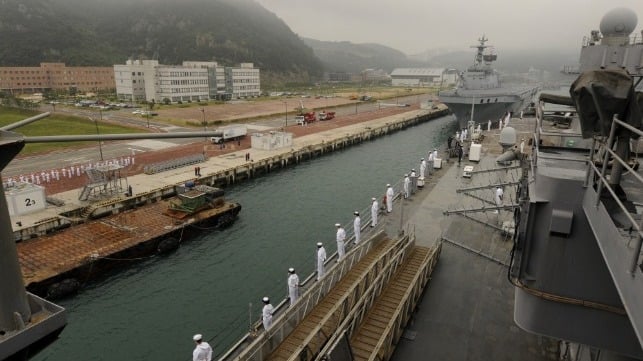 The 7th Fleet headquarters ship USS Blue Ridge, the command at the center of the GDMA scandal, at Busan during the years of Francis' peak influence (USN file image)