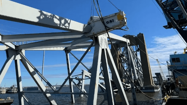 Marine contractors cut through the wreckage of the Key Bridge, 2024 (USACE)