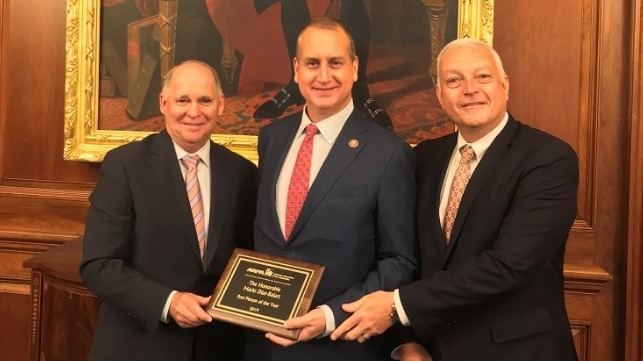 AAPA CEO Kurt Nagle (left) and PortMiami Port Director Juan Kuryla (right) present Rep. Mario Diaz-Balart with AAPA's 2019 Port Person of the Year Award