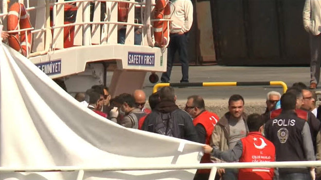 migrants board ferry