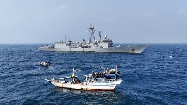 hijacked fishing boat with warship