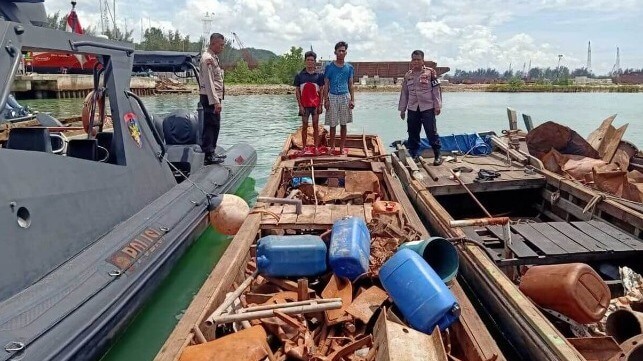 Seized scrap metal aboard a wooden launch in the Riau Islands