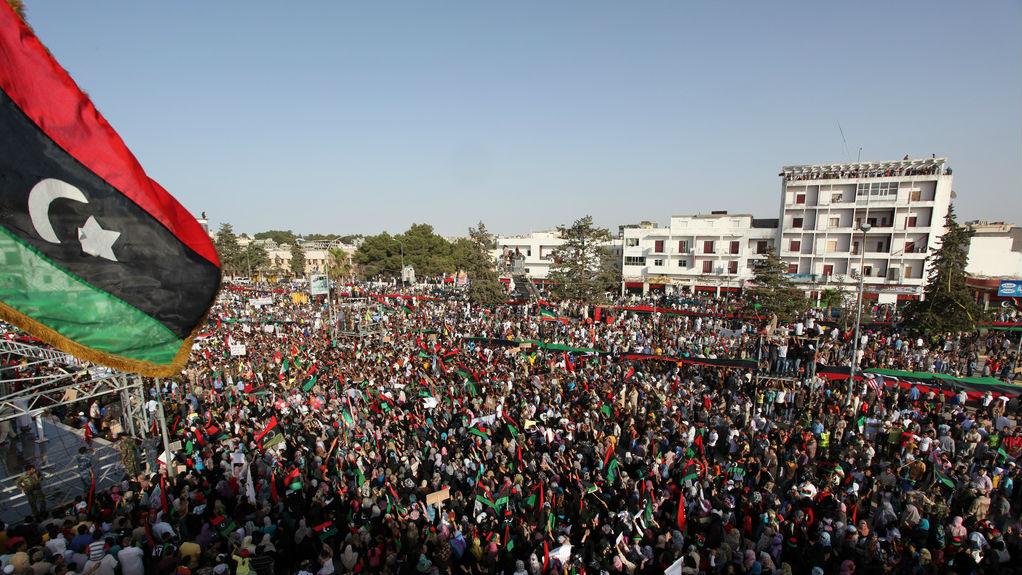 Libya flag and protesters