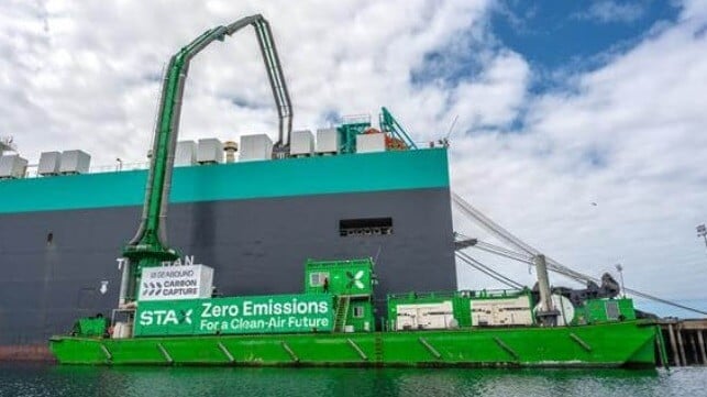 emission capture barge alongside in-service vessel