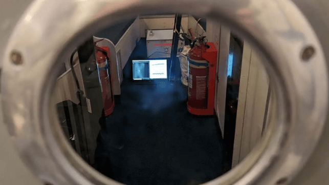 Aquark's small, portable inertial navigation system inside a compartment aboard HMS Pursuer (Royal Navy)