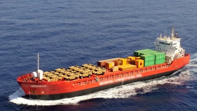 Dutch cargo ship carrying trucks