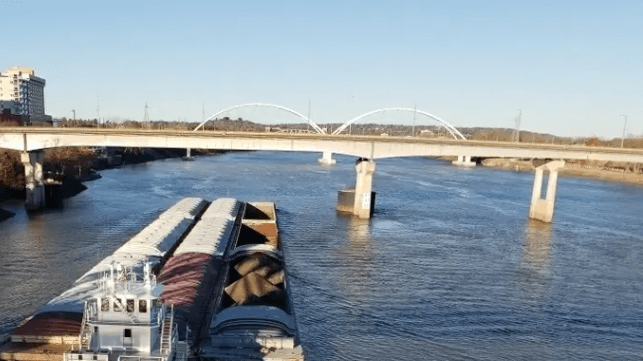 File image: barge tow navigation on the Arkansas River at Little Rock, 2018 (USACE)