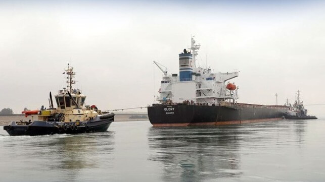 bulker towed after grounding in Suez Canal