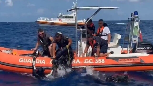 Italian divers come aboard a RIB