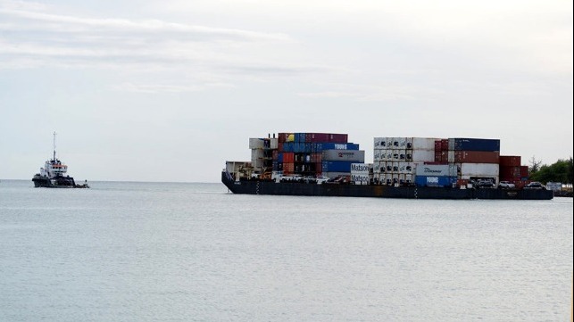 21 shipping containers fell into the ocean from a barge off Hilo Hawaii