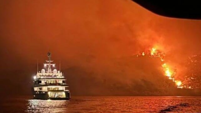 Yacht burning island