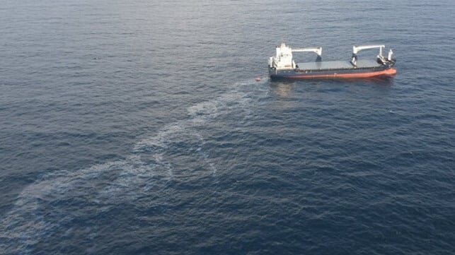 abandon cargo ship leaking oil