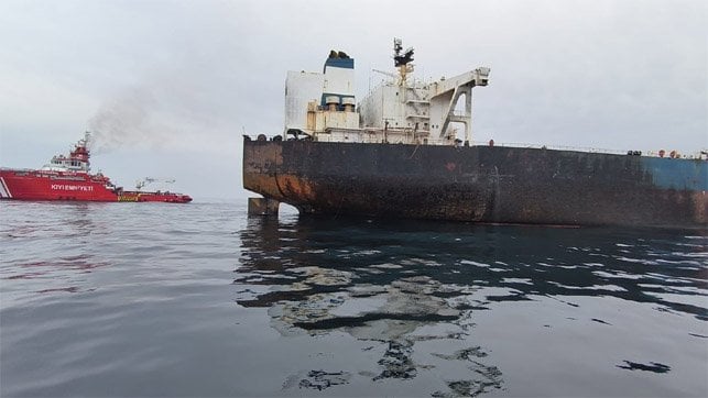 fire damaged tanker and rescue vessel