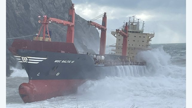grounded containership in heavy weather