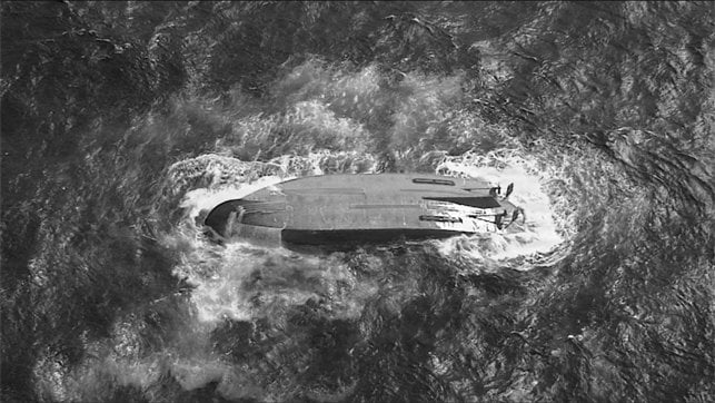 overturned capsized cargo ship Mariana Islands