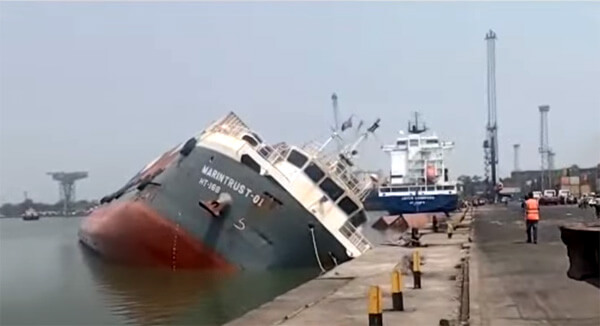 Video: Improperly Loaded Cargo Ship Heels Over in India Losing Boxes 