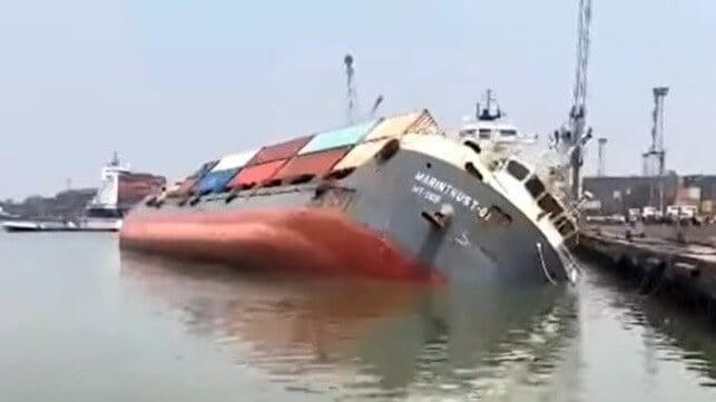 containership heels over and loses containers overboard