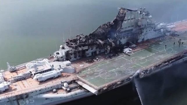 Minsk's superstructure collapsed in the heat of the fire. Soot marks can be seen above portholes forward, suggesting that the blaze also spread belowdecks (Chinese social media)