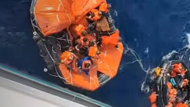 crew in liferaft