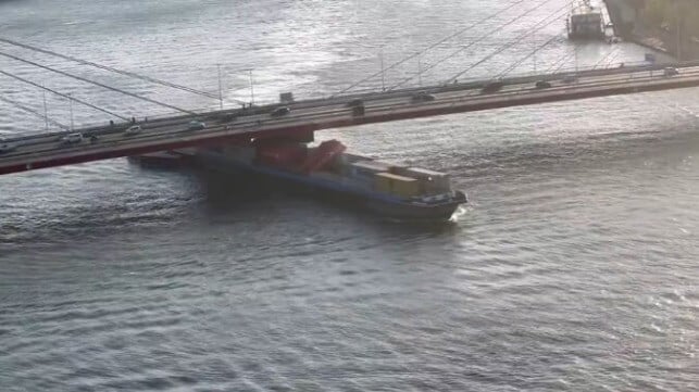 inland cargo ship hitting bridge