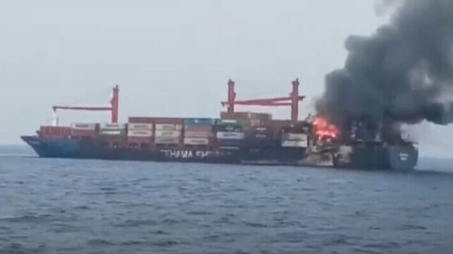 containership damaged by fire sinks