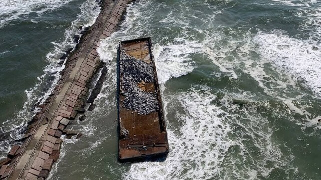 Barge aground on a jetty