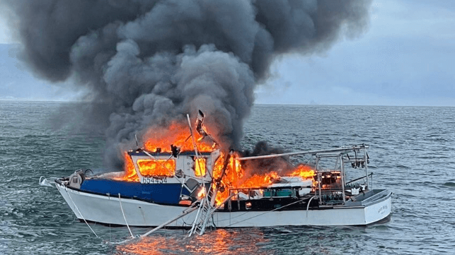 burning fishing vessel