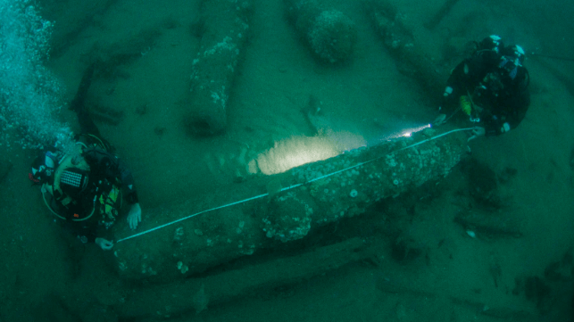 Divers explore ancient shipwreck - The Columbian